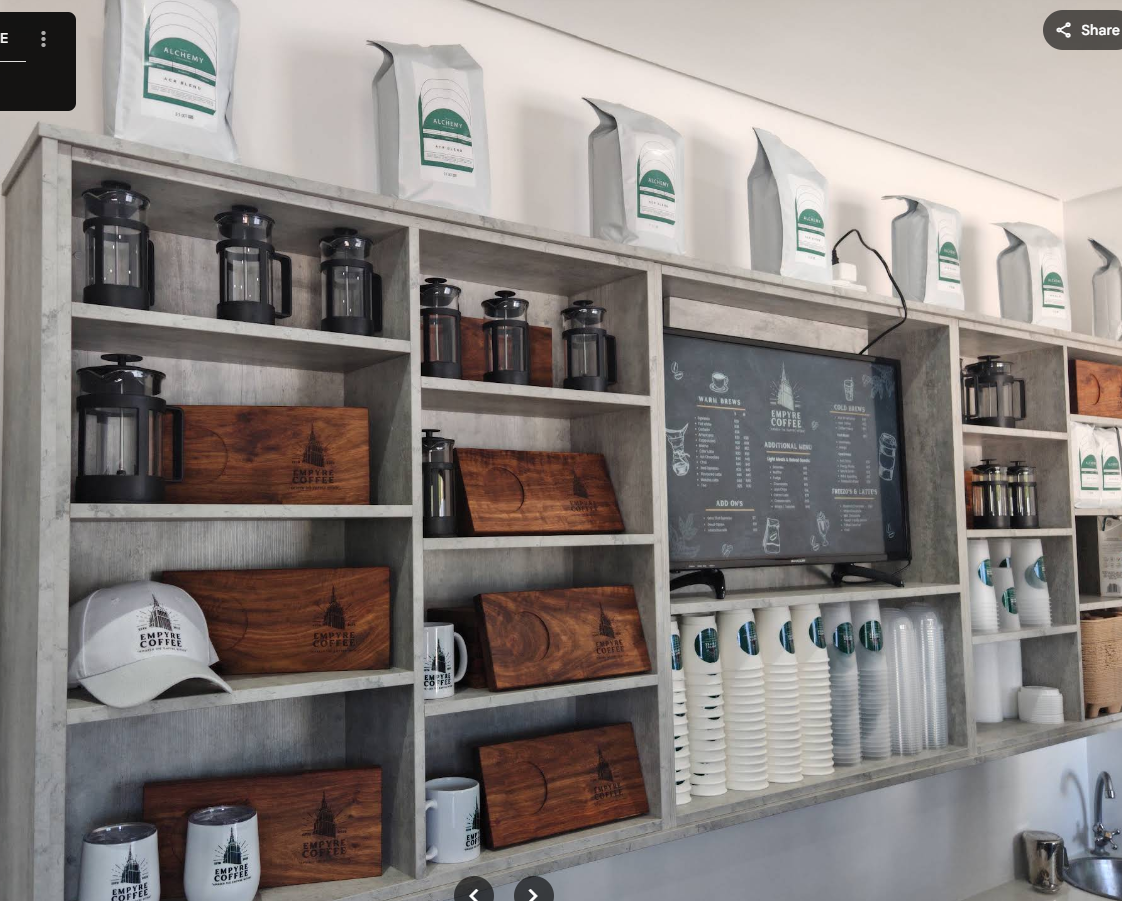 Shelves with french presses and beans